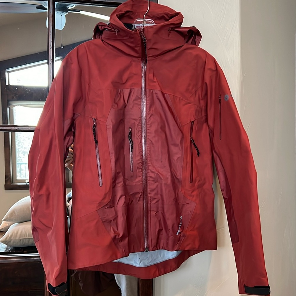 Westcomb women’s rain jacket. Size small. Burnt orange